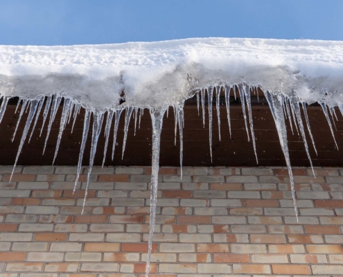 Close Up Of An Ice Dam On Roof
