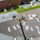 Overhead View Of Apartment Roof Being Replaced