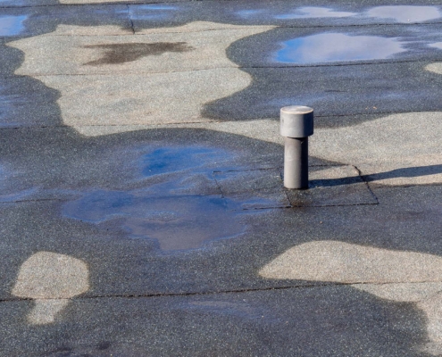 Water Sitting On Top Of Flat Roof