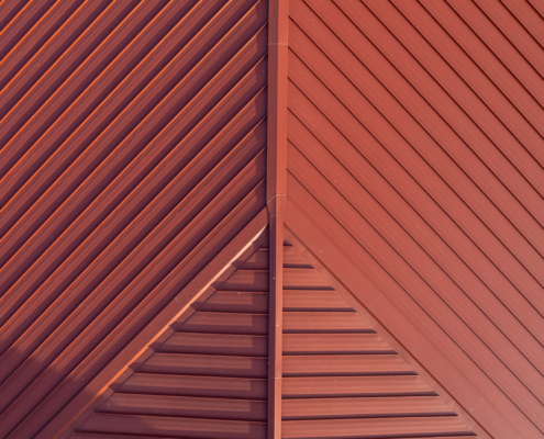 Aerial View Of Metal Red Roof